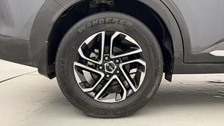 Used 2022 Kia Carens Luxury Plus 1.4 Petrol 7 STR Petrol Manual tyres RIGHT REAR TYRE RIM VIEW