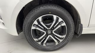 Used 2021 Tata Tiago Revotron XZ Petrol Manual tyres LEFT FRONT TYRE RIM VIEW