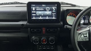 Used 2023 maruti-suzuki Jimny Alpha 1.5l Petrol AT Dual tone Petrol Automatic interior MUSIC SYSTEM & AC CONTROL VIEW