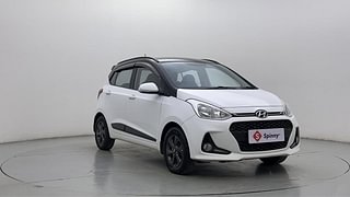 Used 2018 Hyundai Grand i10 [2017-2020] Sportz 1.2 Kappa VTVT Dual Tone Petrol Manual exterior RIGHT FRONT CORNER VIEW