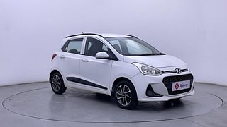 Used 2017 Hyundai Grand i10 [2017-2020] Sportz (O) AT 1.2 Kappa VTVT Petrol Automatic exterior RIGHT FRONT CORNER VIEW