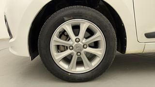 Used 2014 Hyundai Grand i10 [2013-2017] Asta AT 1.2 Kappa VTVT Petrol Automatic tyres LEFT FRONT TYRE RIM VIEW
