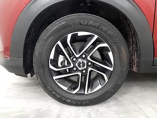 Used 2022 Kia Carens Luxury Plus 1.4 Petrol 6 STR Petrol Manual tyres LEFT FRONT TYRE RIM VIEW