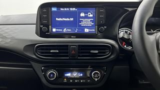 Used 2022 Hyundai Grand i10 Nios Sportz 1.2 Kappa VTVT Dual Tone Petrol Manual interior MUSIC SYSTEM & AC CONTROL VIEW