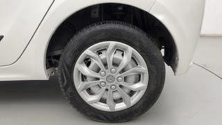 Used 2021 Tata Tiago Revotron XE Petrol Manual tyres LEFT REAR TYRE RIM VIEW
