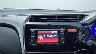 Used 2014 Honda City [2014-2017] V Petrol Manual top_features Integrated (in-dash) music system