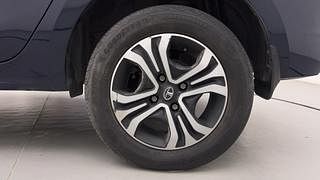 Used 2022 Tata Tigor Revotron XZ+ CNG Petrol+cng Manual tyres LEFT REAR TYRE RIM VIEW