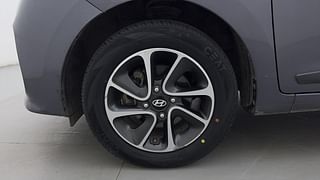 Used 2017 Hyundai Grand i10 [2017-2020] Sportz (O) AT 1.2 Kappa VTVT Petrol Automatic tyres LEFT FRONT TYRE RIM VIEW