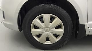 Used 2010 Maruti Suzuki Swift Dzire VXI 1.2 Petrol Manual tyres LEFT FRONT TYRE RIM VIEW