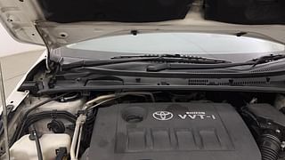Used 2014 Toyota Corolla Altis [2014-2017] G Petrol Petrol Manual engine ENGINE RIGHT SIDE HINGE & APRON VIEW