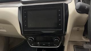 Used 2022 maruti-suzuki Dzire ZXI AMT Petrol Automatic top_features Integrated (in-dash) music system