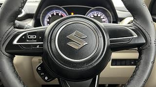 Used 2022 maruti-suzuki Dzire VXI Petrol Manual top_features Steering mounted controls