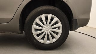 Used 2015 Maruti Suzuki Swift Dzire VXI Petrol Manual tyres LEFT REAR TYRE RIM VIEW