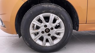 Used 2015 Tata Tiago [2016-2020] Revotron XZ Petrol Manual tyres LEFT FRONT TYRE RIM VIEW