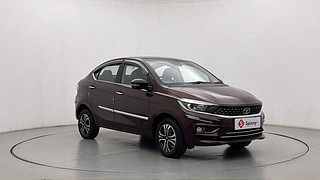 Used 2022 Tata Tigor Revotron XZ+ CNG Dual Tone Petrol+cng Manual exterior RIGHT FRONT CORNER VIEW