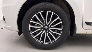 Used 2023 maruti-suzuki Dzire ZXI Plus Petrol Manual tyres LEFT FRONT TYRE RIM VIEW