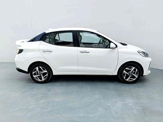 Used 2023 Hyundai Aura SX 1.2 (O) Petrol Petrol Manual exterior RIGHT SIDE VIEW