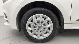 Used 2021 Tata Tiago Revotron XE Petrol Manual tyres LEFT FRONT TYRE RIM VIEW